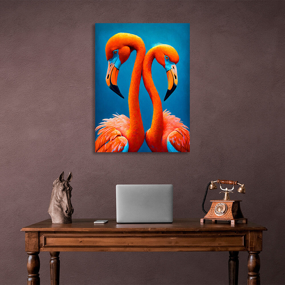 Leinwandbild „Zwei Flamingos auf blauem Hintergrund“