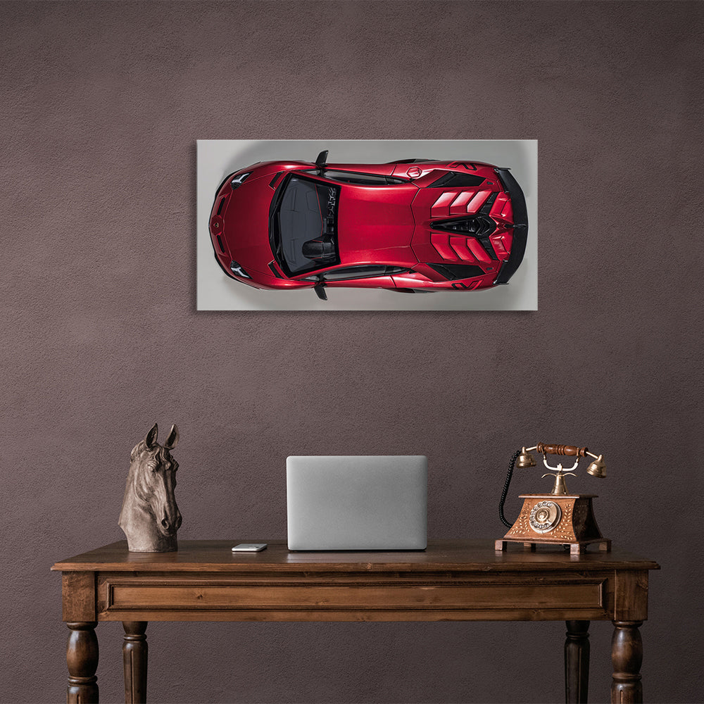 Das Auto ist ein kirschroter Lamborghini-Kunstdruck auf Leinwand.