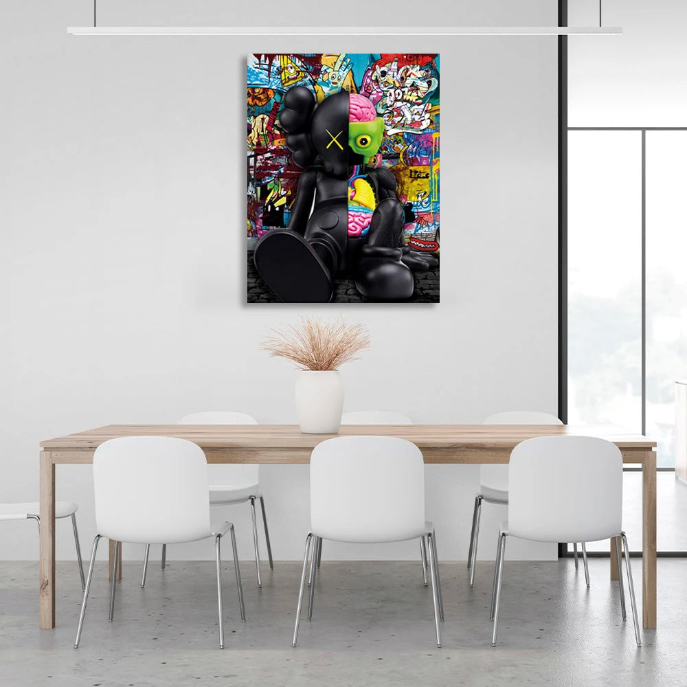 A black doll in the background of graffiti CANVAS Wall Art Print