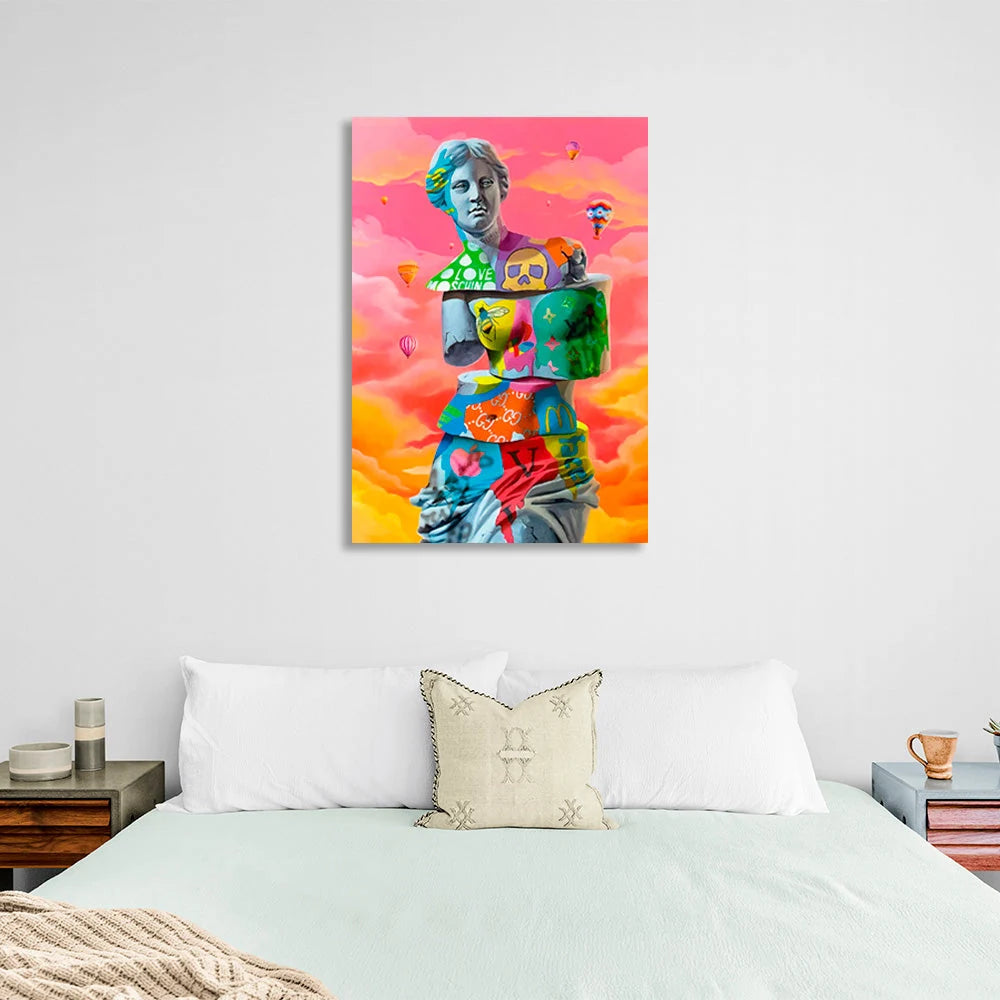 A carved Greek sculpture against a backdrop of soft pink clouds Canvas Wall Art Print