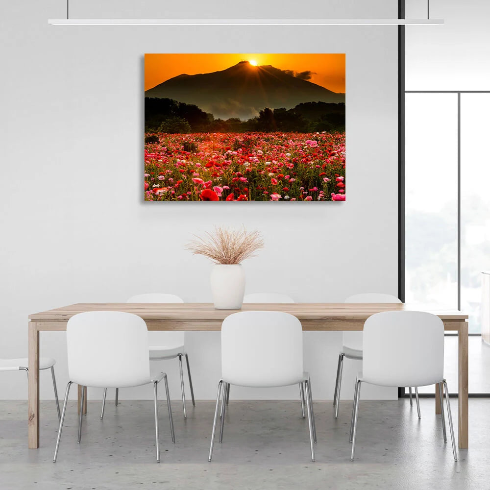 A field of poppies against a background of forest, mountains and sunset Canvas Wall Art Print