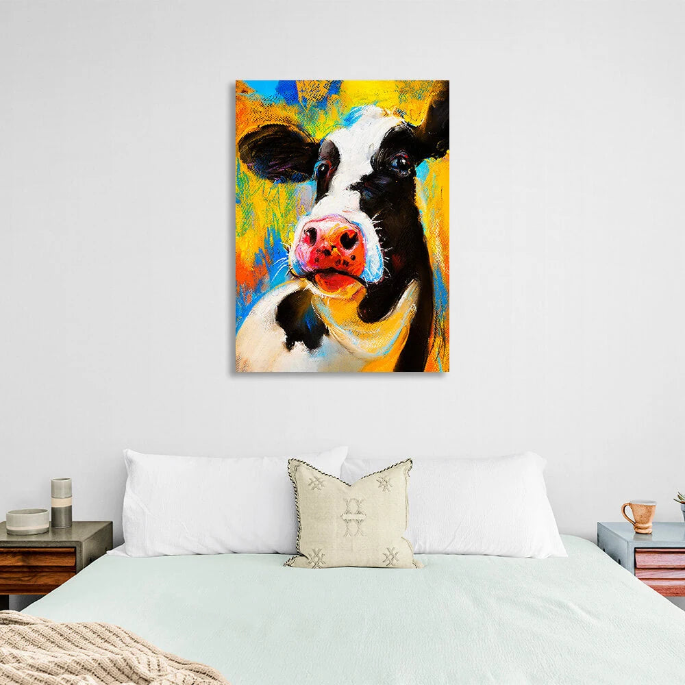 Kunstdruck auf Leinwand, Motiv: schwarz-weiße Kuh auf gelbem und blauem Hintergrund