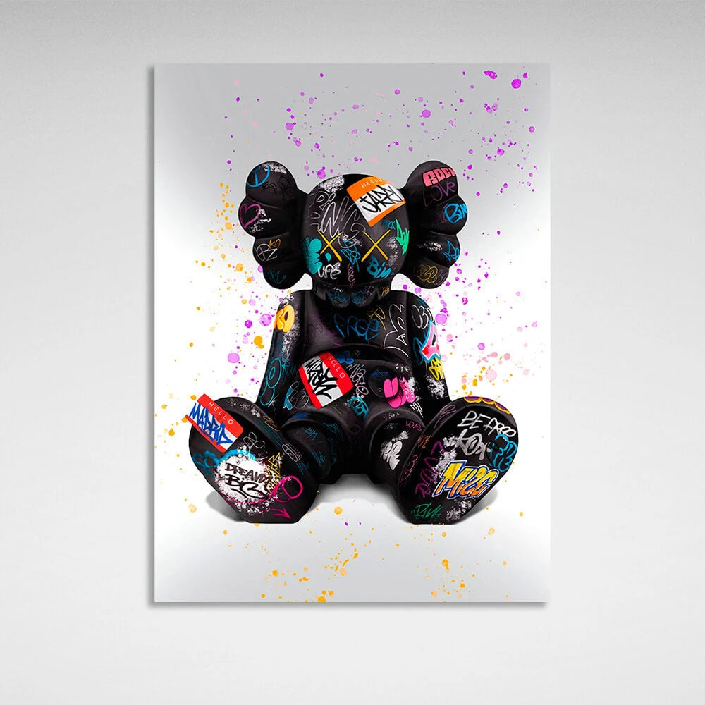 Schwarze Puppe auf grauem Hintergrund mit farbigen Flecken CANVAS Wand Kunstdruck