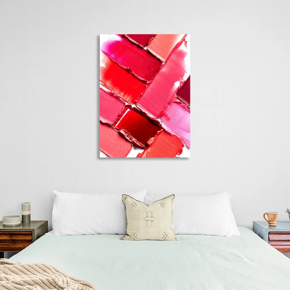 Leinwandbild mit Farbmustern von hellen Lippenstiften auf weißem Hintergrund.