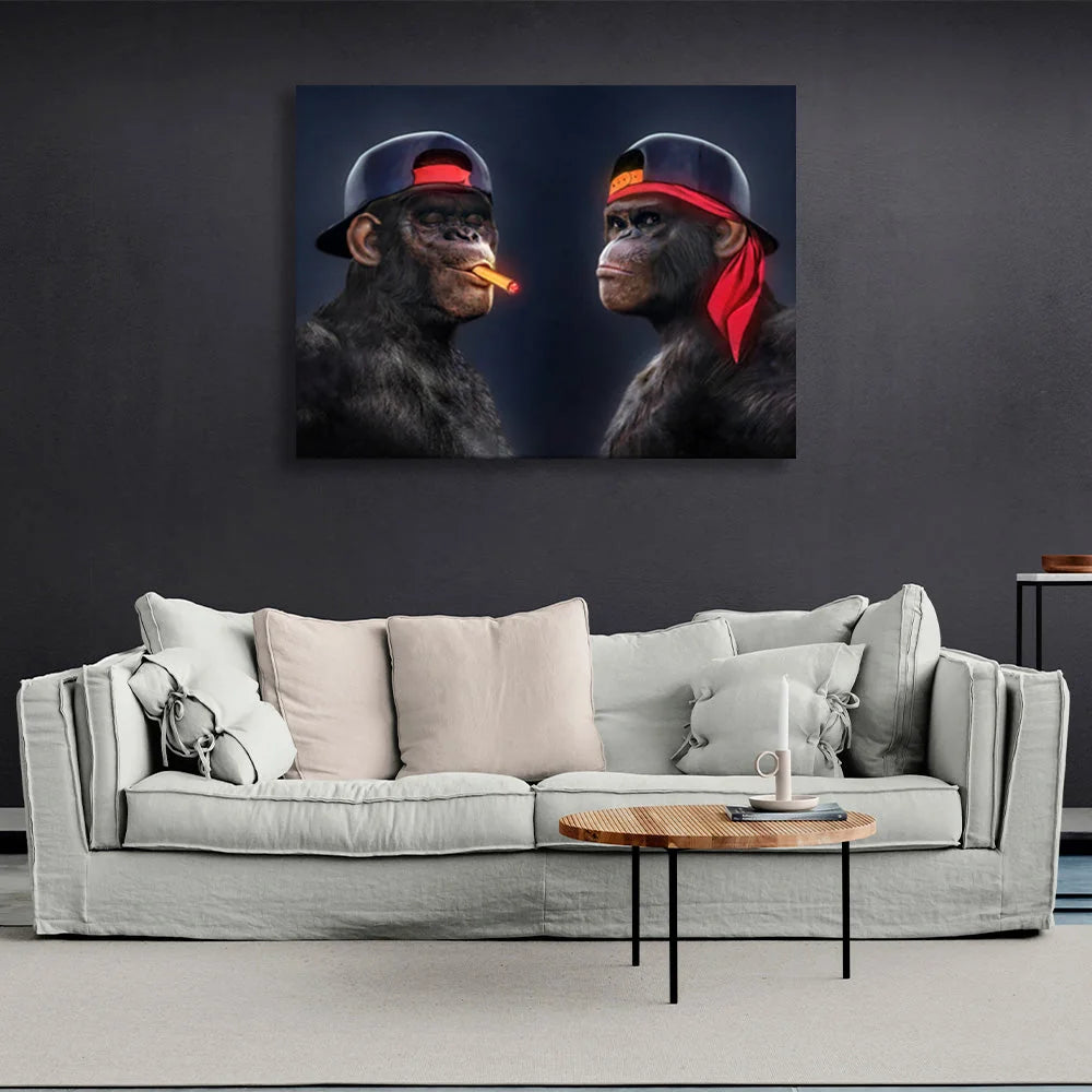 Two black gorillas with caps and one cigar Canvas Wall Art Print