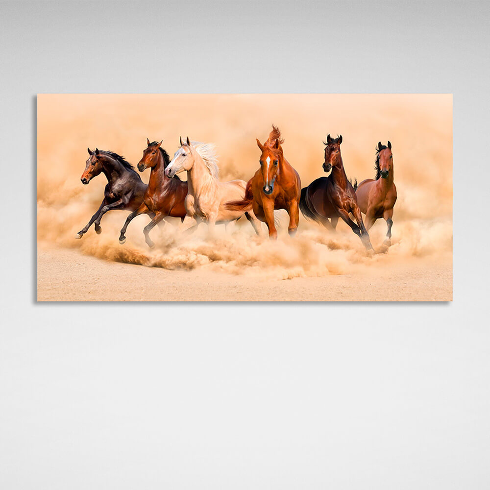 Six horses running across the sand in beige colors Canvas Wall Art Print