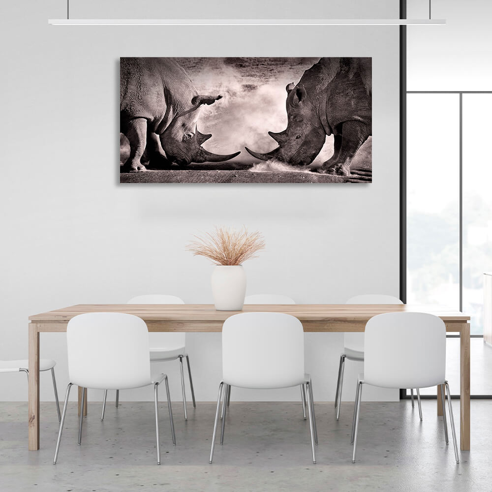 Two rhinos against the sand Canvas Wall Art Print