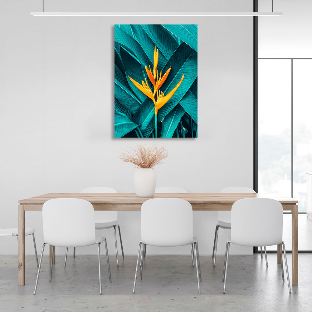 Yellow heliconia against its own green leaves Canvas Wall Art Print