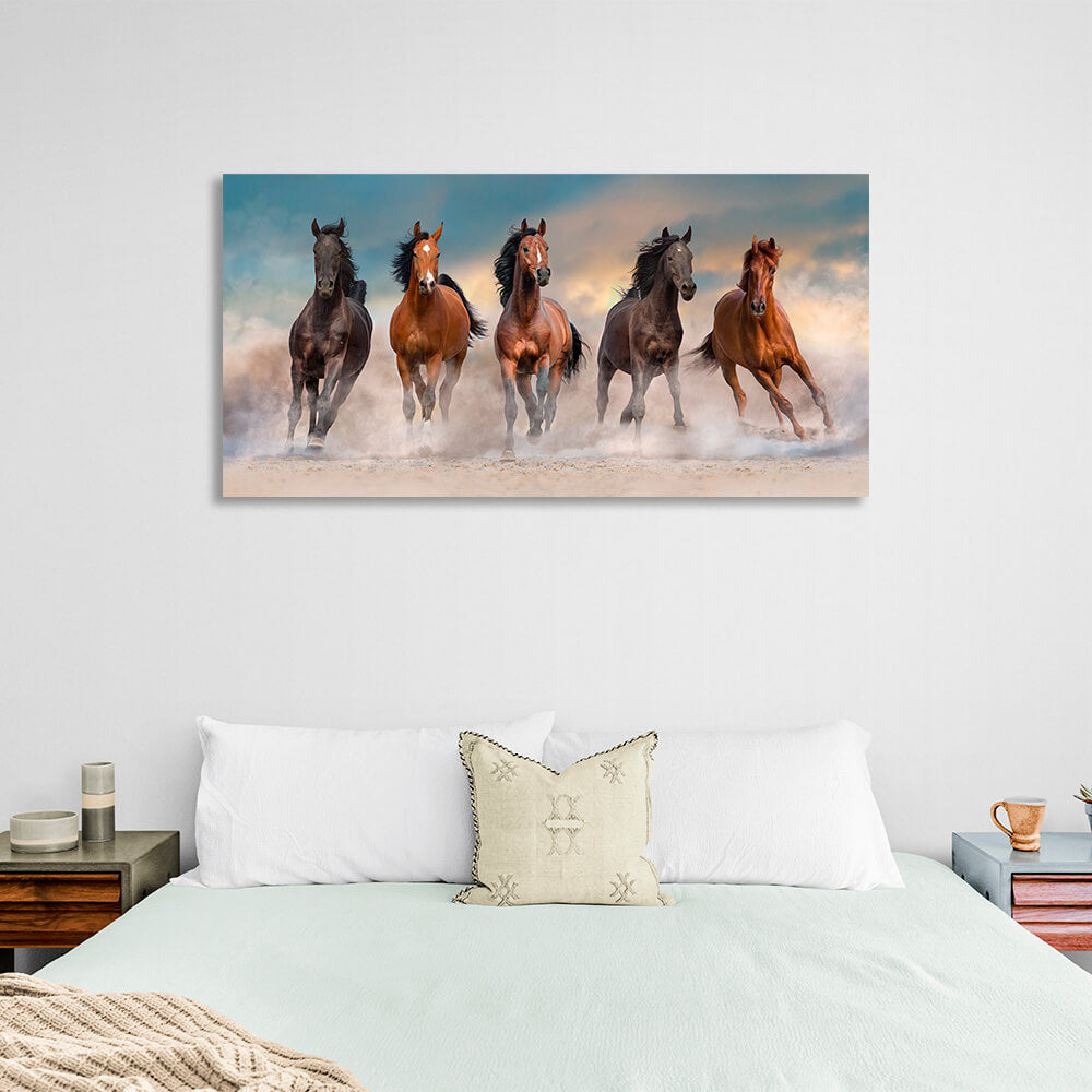 5 horses running through the desert against the blue sky Canvas Wall Art Print