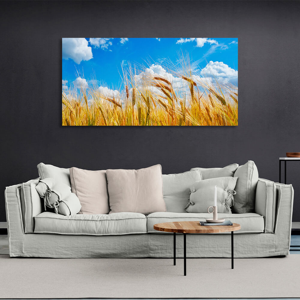 Spikes of wheat on the background of blue sky with clouds Canvas Wall Art Print