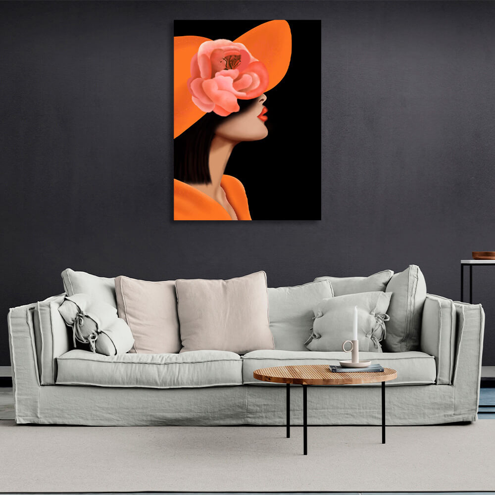 A woman with an orange lip curl and a flowered panama Canvas Wall Art Print