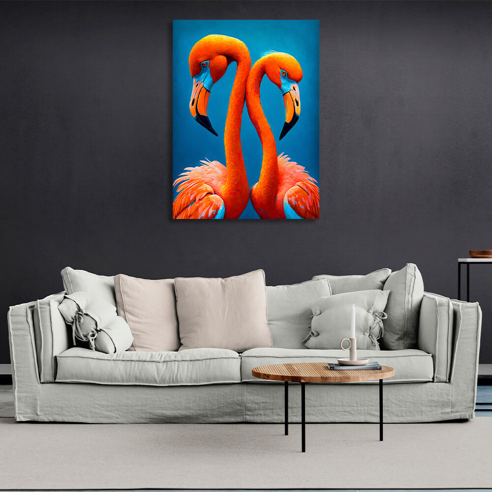 Leinwandbild „Zwei Flamingos auf blauem Hintergrund“