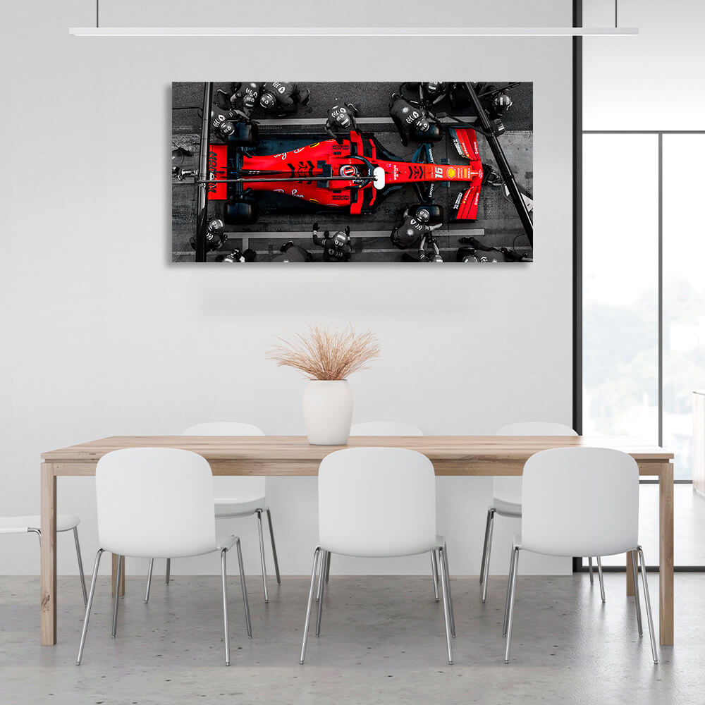 Formula 1 car with people in black suits Canvas Wall Art Print