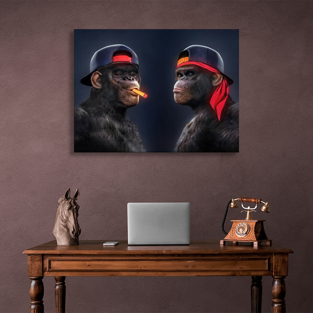 Two black gorillas with caps and one cigar Canvas Wall Art Print