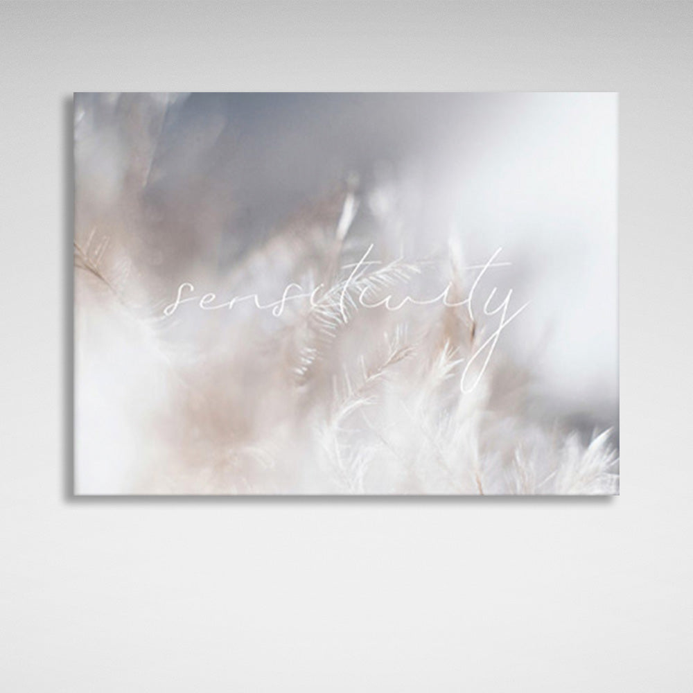 Gently white feathers on a silver background with the inscription Canvas Wall Art Print