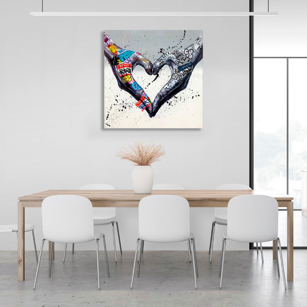 Two hands folded into a heart shape on a gray background in graffiti style Canvas Wall Art Print