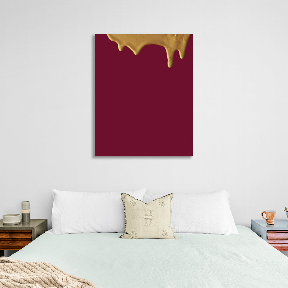 A burgundy canvas with gold paint Canvas Wall Art Print