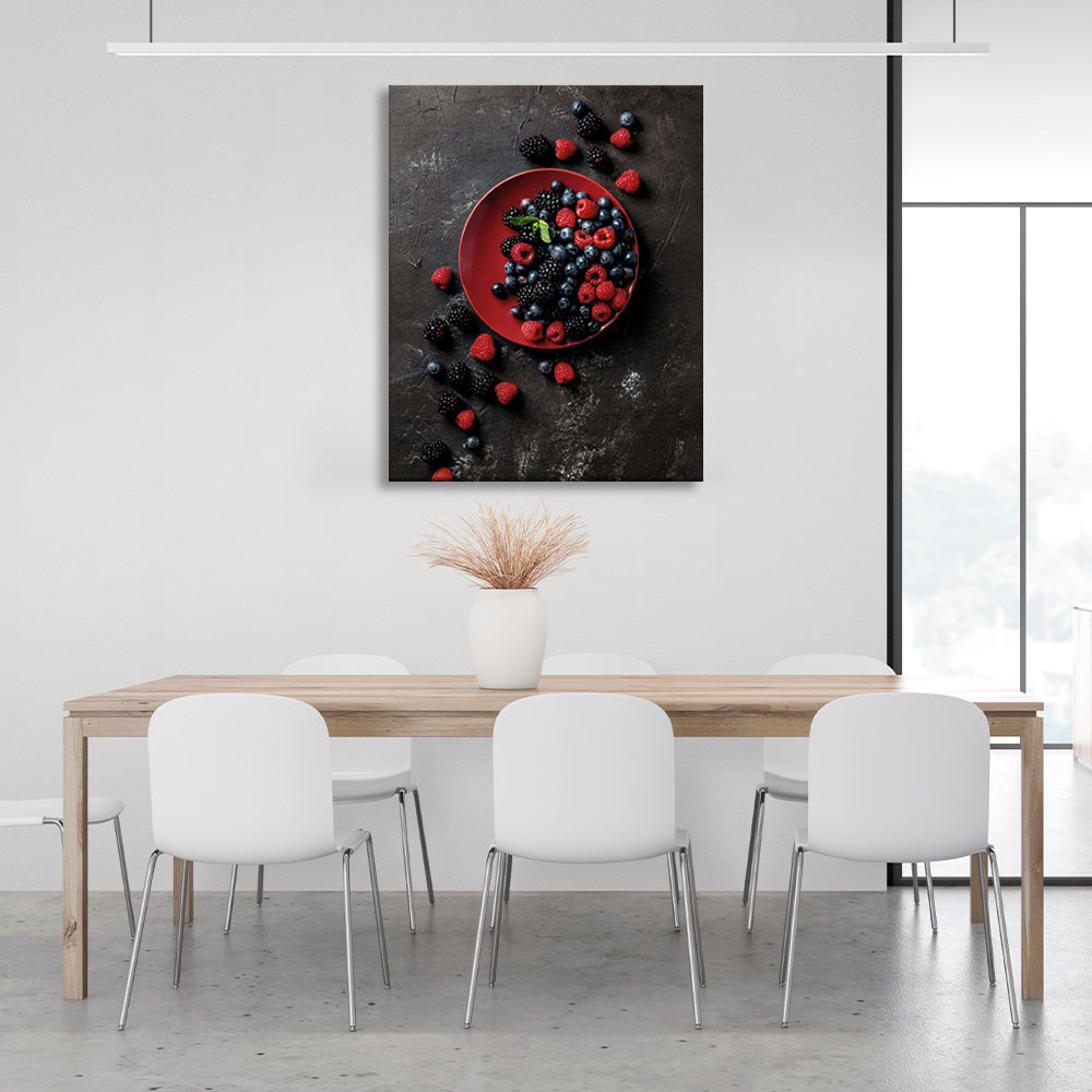 Berries in a red plate on a dark background Canvas Wall Art Print For Kitchen