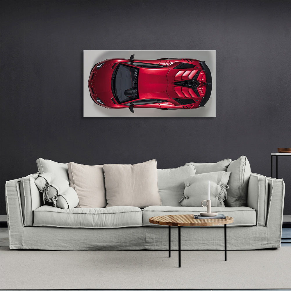 Das Auto ist ein kirschroter Lamborghini-Kunstdruck auf Leinwand.